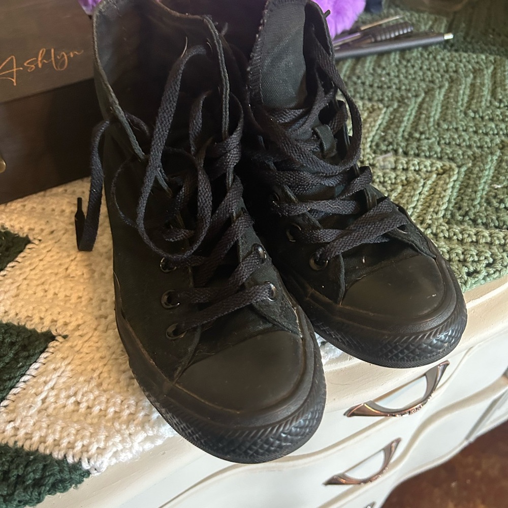 Black High-Top Converse Sneakers